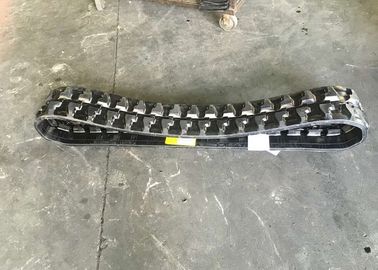Le caoutchouc noir de Caterpillar dépiste le poids 55kg avec de la basse pression au sol
